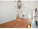 Bright and open living room with hardwood floors, fireplace, and staircase leading upstairs at 7216 Bluffside Ct, Raleigh, NC 27615
