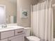 Bathroom featuring vanity with white sink, white toilet, and shower-tub combination at 730 Firebrick Drive Dr, Cary, NC 27519