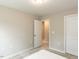 Neutral bedroom featuring carpet flooring, light walls, and white trim for a calming atmosphere at 730 Firebrick Drive Dr, Cary, NC 27519