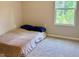 Cozy bedroom with natural light and plush carpeting at 730 Firebrick Drive Dr, Cary, NC 27519