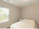 Neutral bedroom with window and wall outlets, featuring carpet flooring at 730 Firebrick Drive Dr, Cary, NC 27519