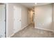 Neutral hallway with carpet and white doors at 730 Firebrick Drive Dr, Cary, NC 27519