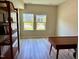 Modern office space with natural light and sleek laminate flooring at 730 Firebrick Drive Dr, Cary, NC 27519