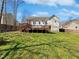 Spacious backyard with a large wooden deck at 80 Somerset Dr, Franklinton, NC 27525