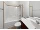 A well-lit bathroom featuring a shower and toilet at 80 Somerset Dr, Franklinton, NC 27525