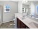 Bathroom with a window and double vanity at 80 Somerset Dr, Franklinton, NC 27525