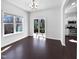 Dining area with sliding glass door and modern chandelier at 80 Somerset Dr, Franklinton, NC 27525