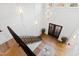 Grand two-story foyer features hardwood floors, stairs with iron railing and elegant lighting at 909 Lake Boone Trl, Raleigh, NC 27607