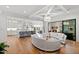 Open-concept living space with a gourmet kitchen, dining area, cozy seating, and modern finishes at 909 Lake Boone Trl, Raleigh, NC 27607
