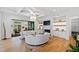 Bright living room features hardwood floors, built-in shelving, and a custom fireplace at 909 Lake Boone Trl, Raleigh, NC 27607