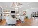 Bright living room features hardwood floors, built-in shelving, and a custom fireplace at 909 Lake Boone Trl, Raleigh, NC 27607