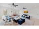 Spacious living room with plush seating, stylish decor, and recessed lighting for a cozy and inviting atmosphere at 909 Lake Boone Trl, Raleigh, NC 27607