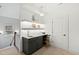 Bright office area with sink and built-in cabinets, perfect for productivity with natural light and functional design at 909 Lake Boone Trl, Raleigh, NC 27607