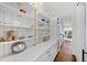 Butler's pantry with marble countertops, custom cabinets, and stainless steel appliances at 909 Lake Boone Trl, Raleigh, NC 27607