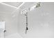 Luxurious shower offers sleek fixtures, marble tiles, and a window at 909 Lake Boone Trl, Raleigh, NC 27607