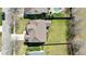 Aerial view of the house showcasing a vast, well-maintained yard and the home's roof at 9117 Cornwell Dr, Wake Forest, NC 27587
