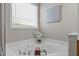 Close up of soaking tub with chrome hardware and a small decor accents at 9117 Cornwell Dr, Wake Forest, NC 27587
