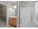 Bathroom featuring a glass shower, vanity, and decorative artwork at 9117 Cornwell Dr, Wake Forest, NC 27587
