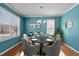 Elegant dining room with a modern chandelier and ample seating for gatherings at 9117 Cornwell Dr, Wake Forest, NC 27587