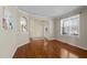 Open living area featuring hardwood floors and plenty of natural light at 9117 Cornwell Dr, Wake Forest, NC 27587
