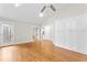 Bedroom with hardwood floors and access to an outside door at 102 Caymus Ct, Cary, NC 27519
