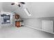 Bonus room showcasing gray carpet and a sink and wet bar area at 102 Caymus Ct, Cary, NC 27519