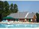 Enjoy a summer day at the pool with plenty of lounge chairs and an adjacent covered picnic area at 102 Caymus Ct, Cary, NC 27519