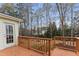 A wooden deck offers a relaxing outdoor space with backyard views at 102 Caymus Ct, Cary, NC 27519