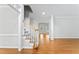 Elegant foyer with hardwood floors, staircase, and lots of light at 102 Caymus Ct, Cary, NC 27519