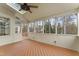 A screened porch provides an airy, bright space to enjoy the outdoors at 102 Caymus Ct, Cary, NC 27519