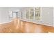 Bright sunroom with many windows and wood flooring at 102 Caymus Ct, Cary, NC 27519