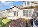 View of the backyard, patio, and exterior of the home with lots of windows at 109 Aisling Ct, Cary, NC 27513