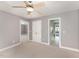 Spacious bedroom with neutral carpet, gray walls and multiple doorways at 109 Aisling Ct, Cary, NC 27513