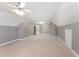 Bonus room offers carpeted floors, neutral paint, and a ceiling fan at 109 Aisling Ct, Cary, NC 27513