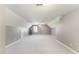 Bonus room offers carpeted floors, neutral paint and a dormer window at 109 Aisling Ct, Cary, NC 27513