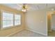 Cozy bedroom with neutral carpet, ceiling fan and bright natural light at 110 Sudbury Ln, Chapel Hill, NC 27516