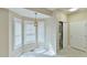 Charming breakfast nook with tiled floors, large windows with plantation shutters, and laundry closet at 110 Sudbury Ln, Chapel Hill, NC 27516