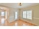 Bright dining area with hardwood floors, plantation shutters and modern lighting at 110 Sudbury Ln, Chapel Hill, NC 27516