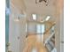 Welcoming entryway boasting hardwood floors, a staircase, and sunlit skylights for a bright interior at 110 Sudbury Ln, Chapel Hill, NC 27516