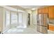 Bright kitchen with stainless steel appliances and breakfast nook at 110 Sudbury Ln, Chapel Hill, NC 27516