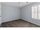 Bedroom with neutral paint, carpet, a ceiling fan, and a window with shutters at 113 Duchess Ln, Chapel Hill, NC 27517