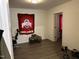 Comfortable bedroom space featuring wood-look floors and ample space at 113 Warren Ave, Oxford, NC 27565