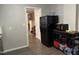 Efficient kitchen space with modern appliances, including a fridge and microwave at 113 Warren Ave, Oxford, NC 27565