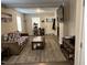 Inviting living room featuring wood-look flooring and ample natural light at 113 Warren Ave, Oxford, NC 27565