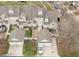 Aerial view of homes and garages, highlighting the neighborhood's layout and curb appeal at 1203 Fairview Club Dr, Wake Forest, NC 27587
