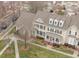 Aerial view of the home, showcasing the well-maintained lawn and tree-lined streets at 1203 Fairview Club Dr, Wake Forest, NC 27587