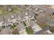Overhead shot of the townhome community, revealing manicured lawns and convenient garage access at 1203 Fairview Club Dr, Wake Forest, NC 27587