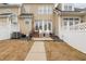 Backyard with patio featuring outdoor seating and a white privacy fence at 1203 Fairview Club Dr, Wake Forest, NC 27587