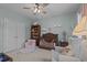 Charming Bedroom with crib, bookshelf, rocking chair, and soft decor at 1203 Fairview Club Dr, Wake Forest, NC 27587