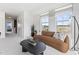 Inviting living room featuring neutral tones and natural light at 1230 Coach Station Alley # 101, Raleigh, NC 27601